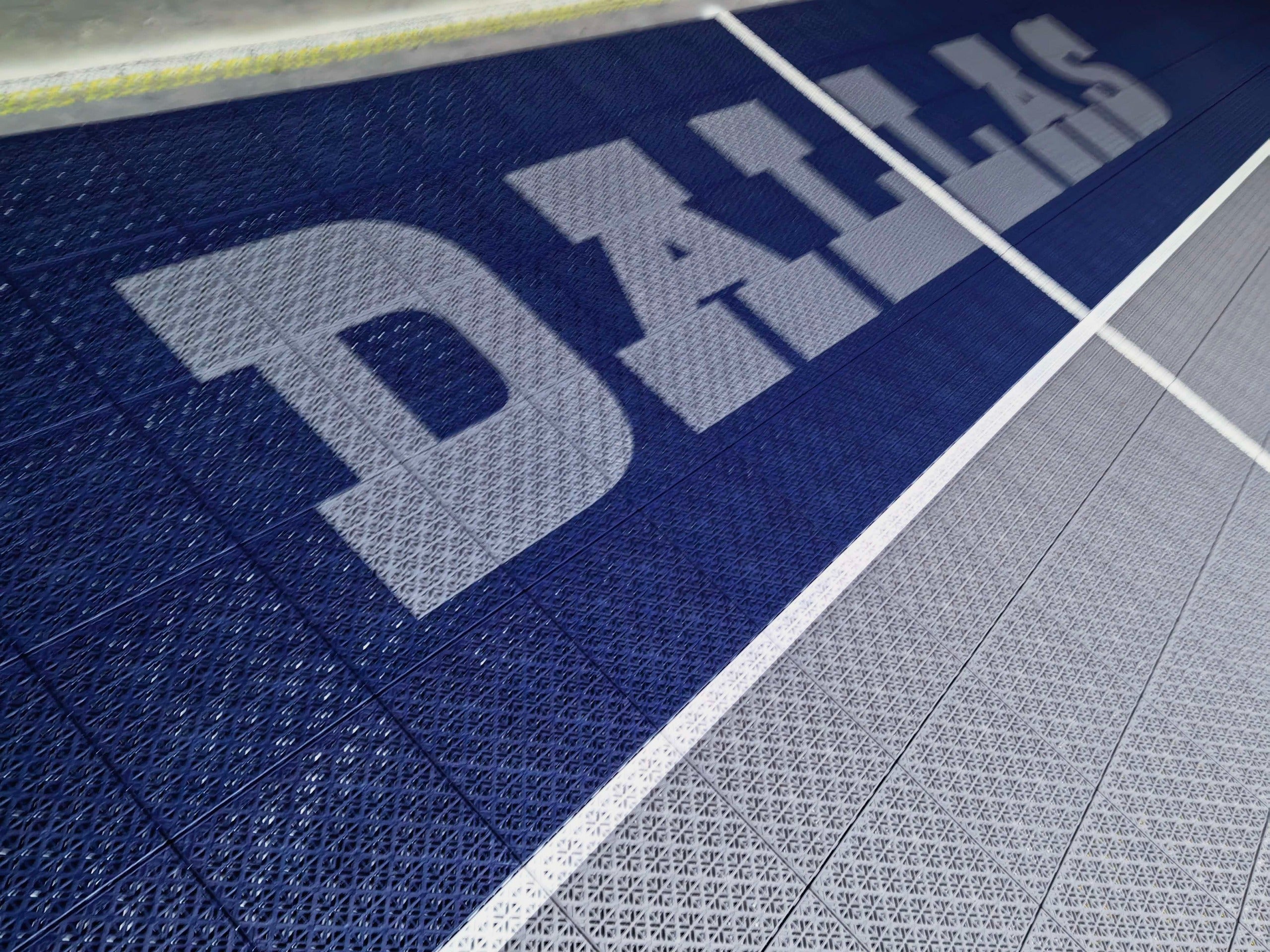 Close view of Dallas lettering and silver court border on Elastic tiles