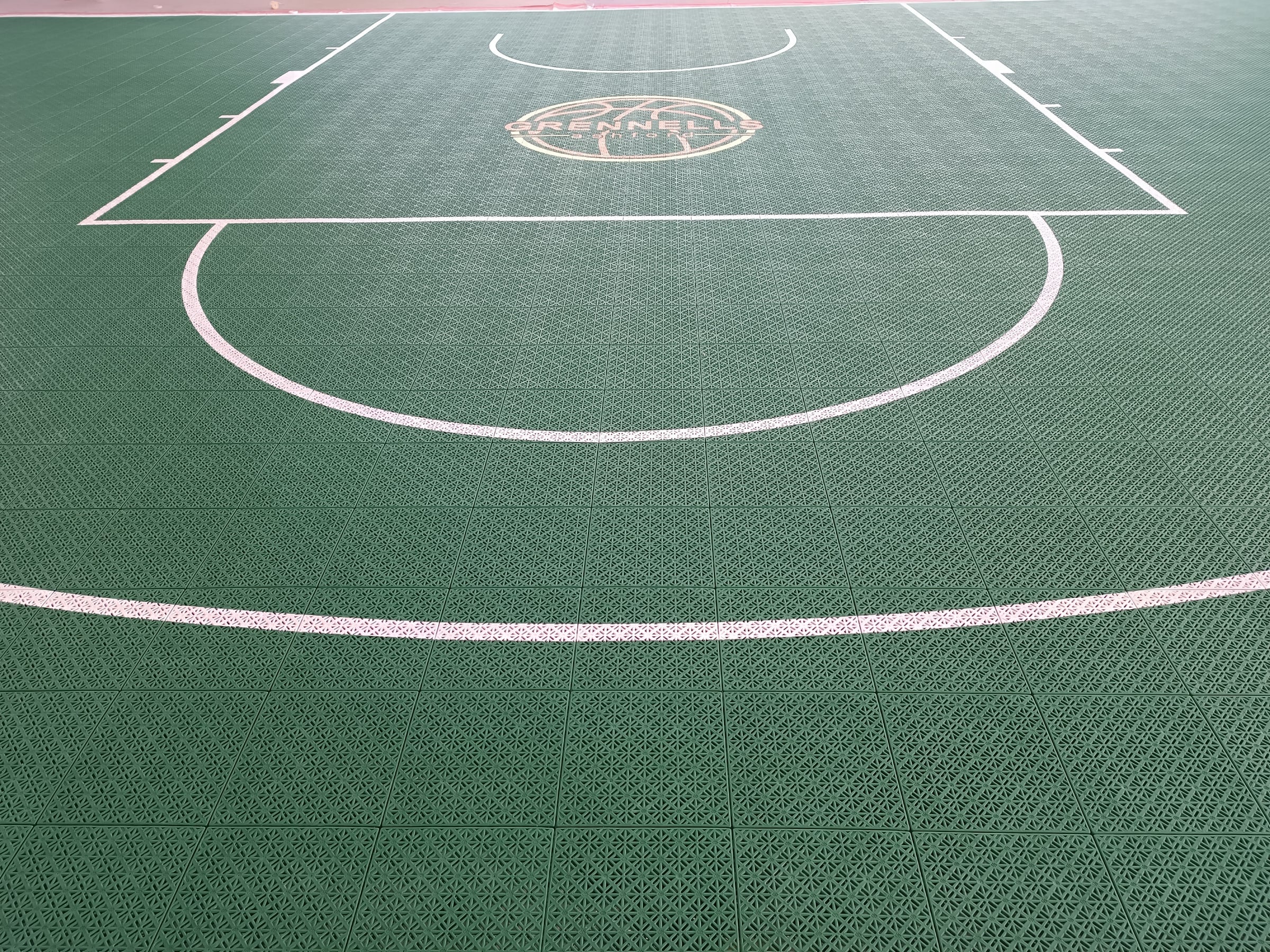 green Grennells Ashford one-hoop Elastic tile backyard basketball court in Ireland, project photo 4