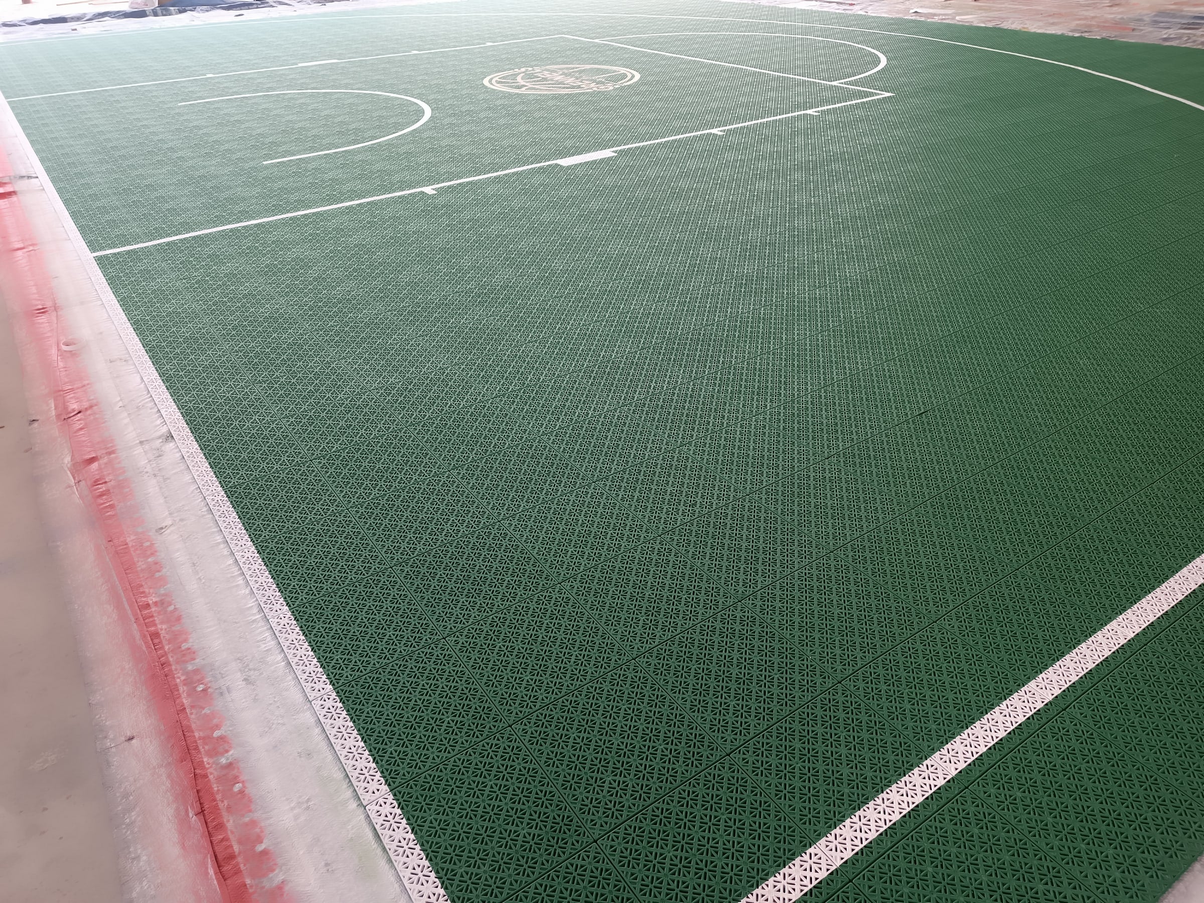 green Grennells Ashford one-hoop Elastic tile backyard basketball court in Ireland, project photo 7