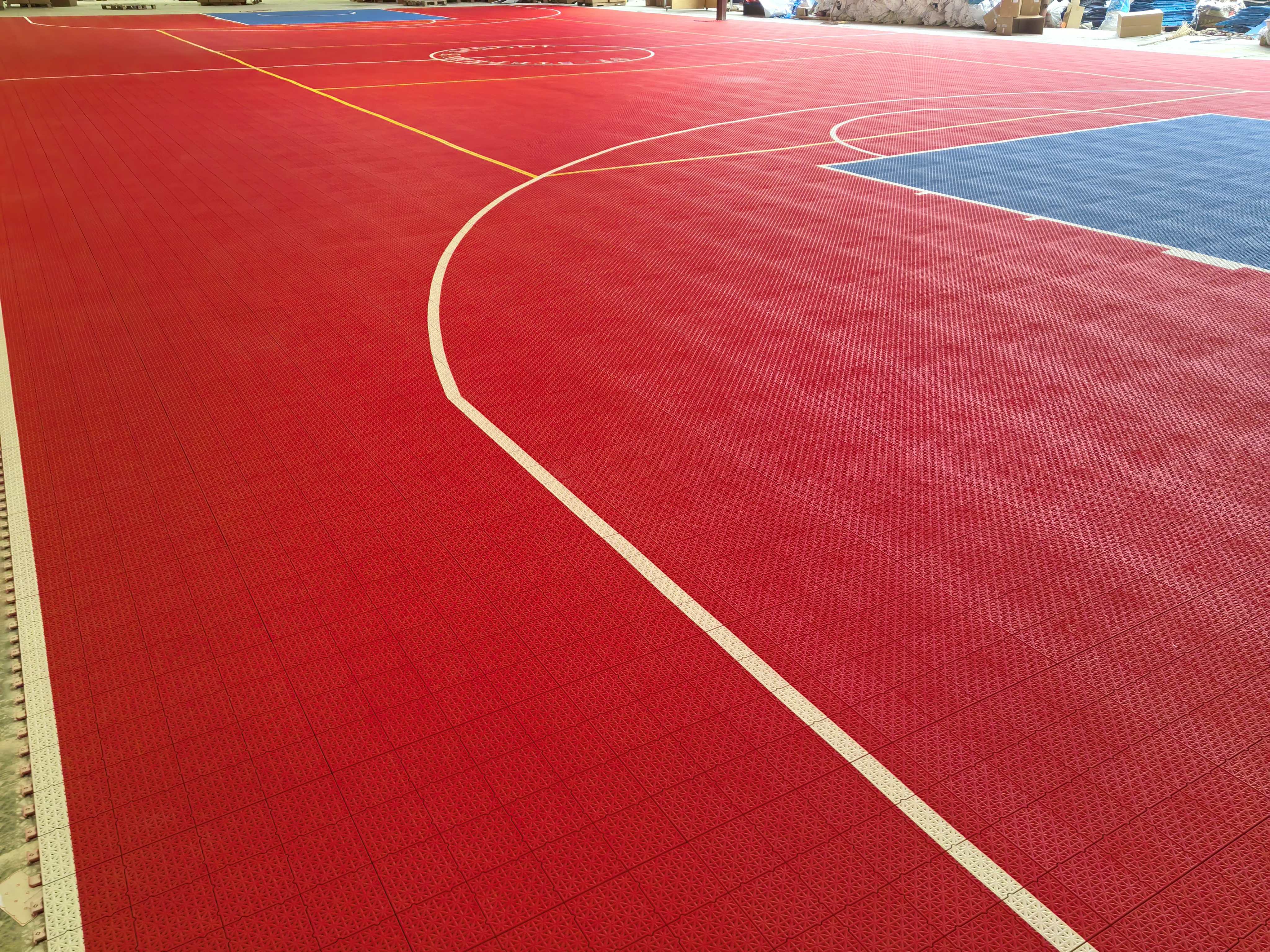 Wide view of the overlapping basketball and volleyball court markings