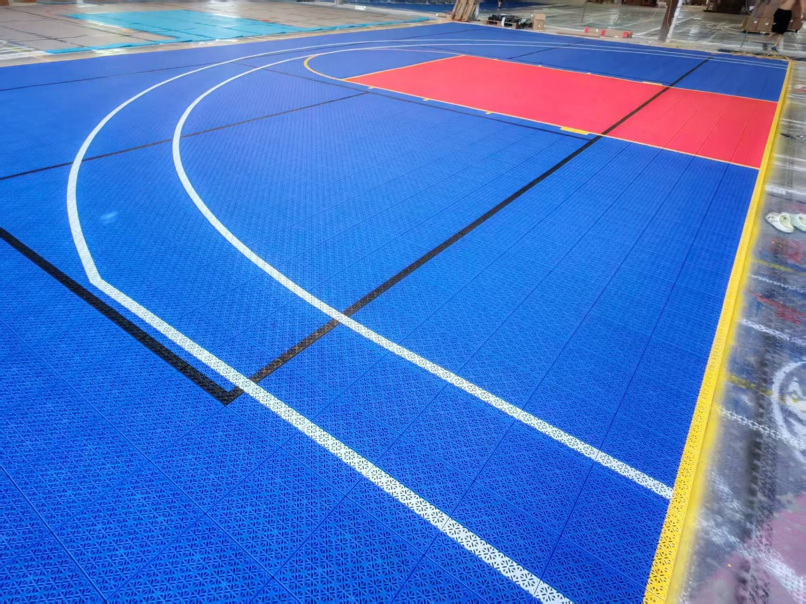 Blue, red, yellow, white, and black Missouri Elastic tile basketball and pickleball court, project photo 1