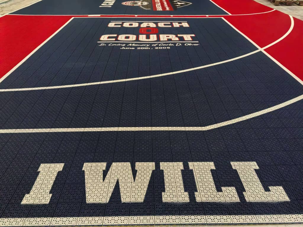 I Will message and Coach O Court branding on the finished training surface