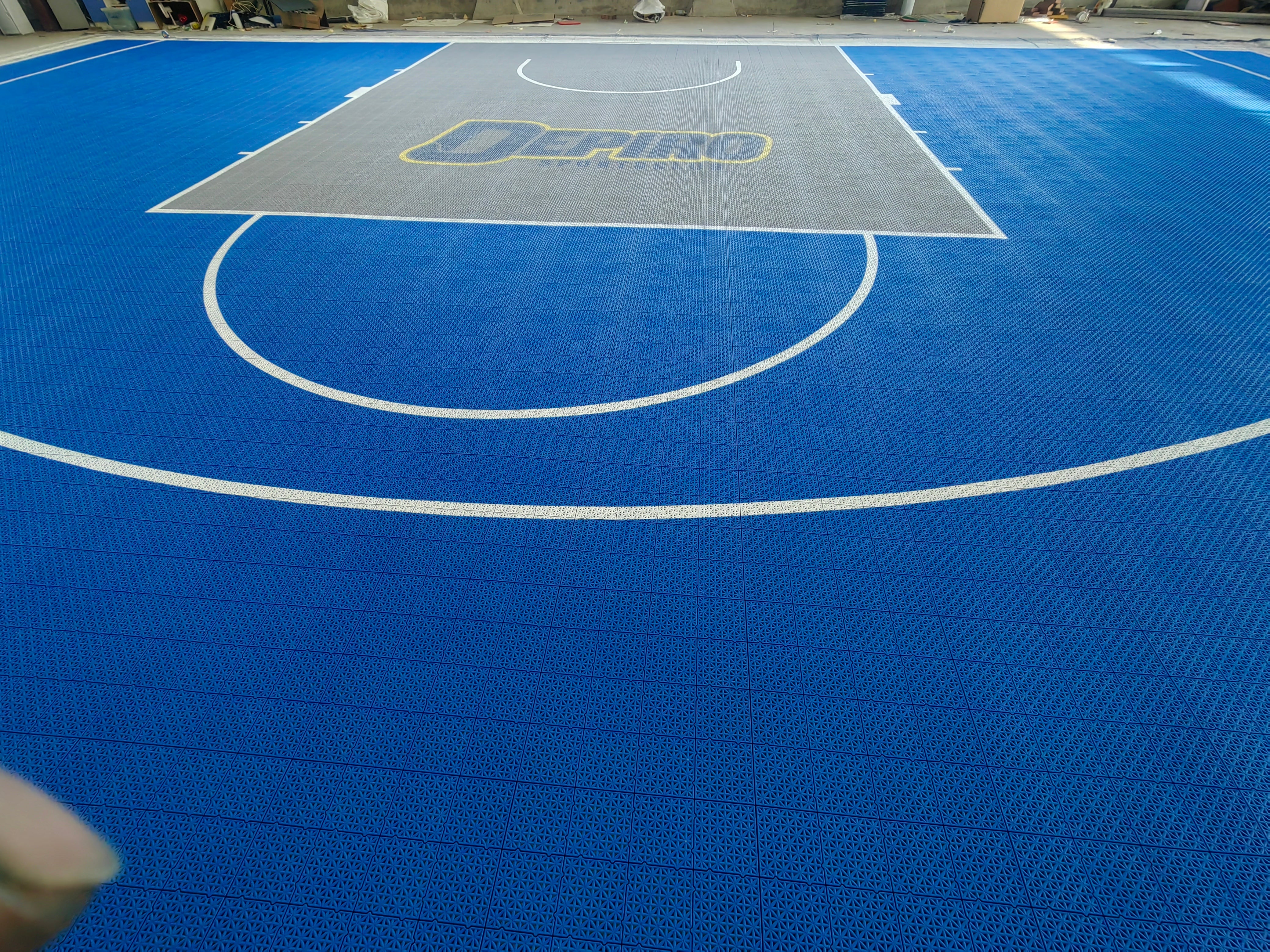 Depiro court key and white three-point arc assembled in the warehouse