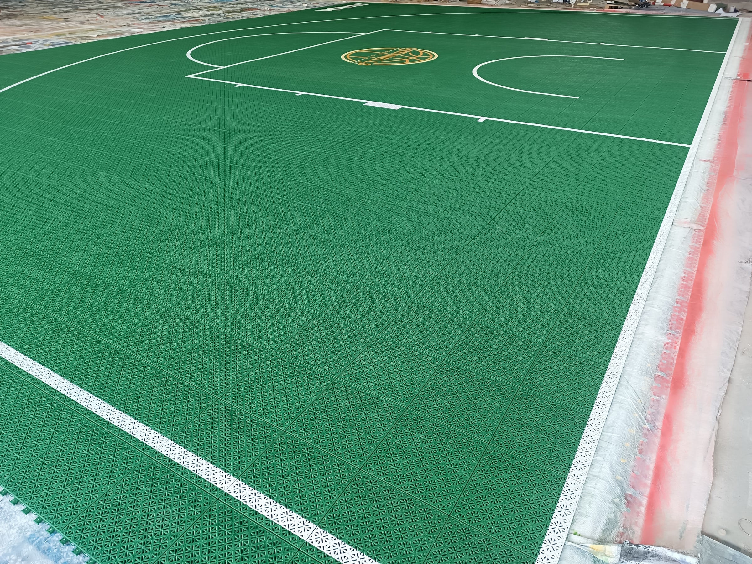 green Grennells Ashford one-hoop Elastic tile backyard basketball court in Ireland, project photo 1
