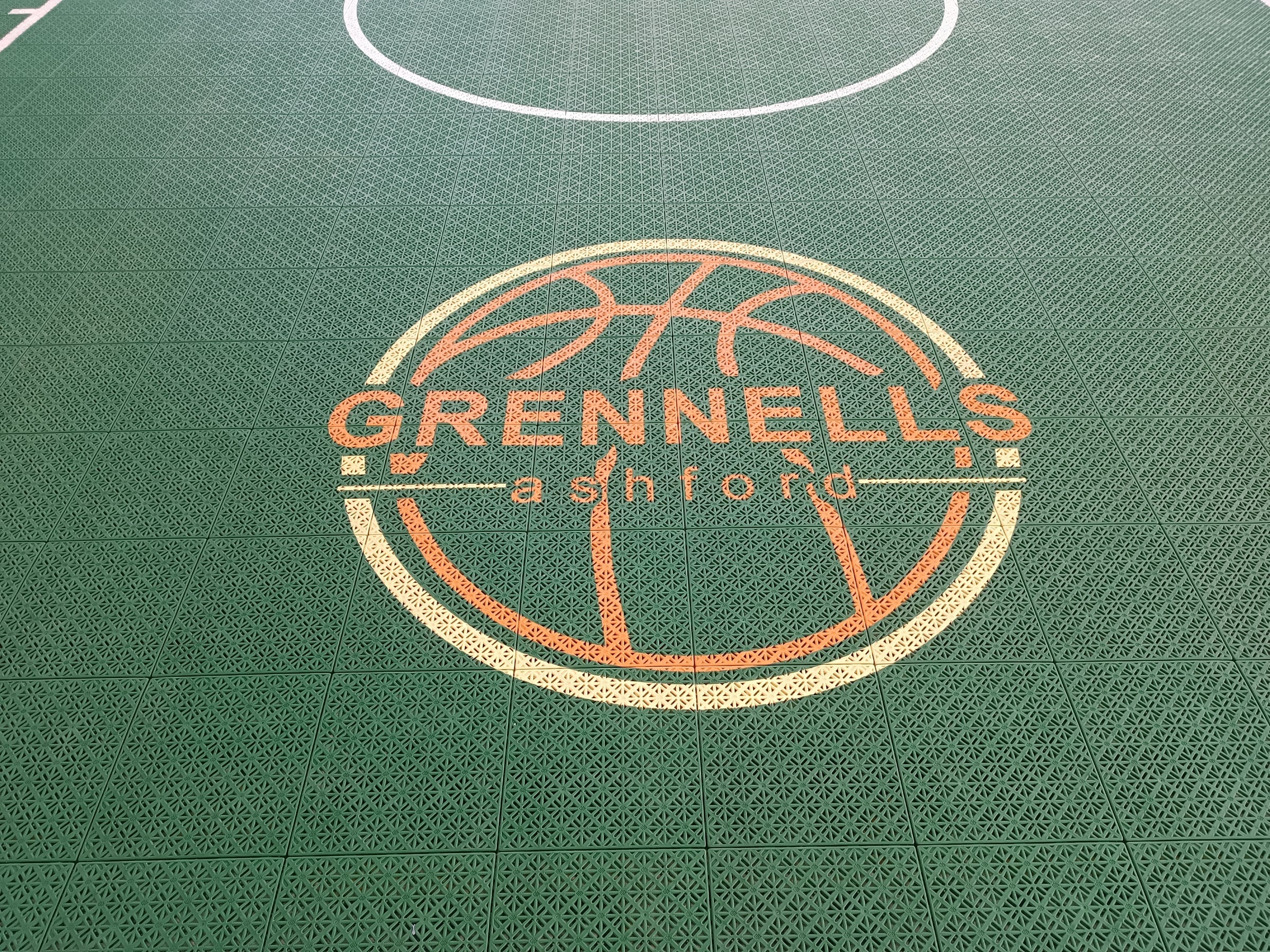 green Grennells Ashford one-hoop Elastic tile backyard basketball court in Ireland, project photo 2