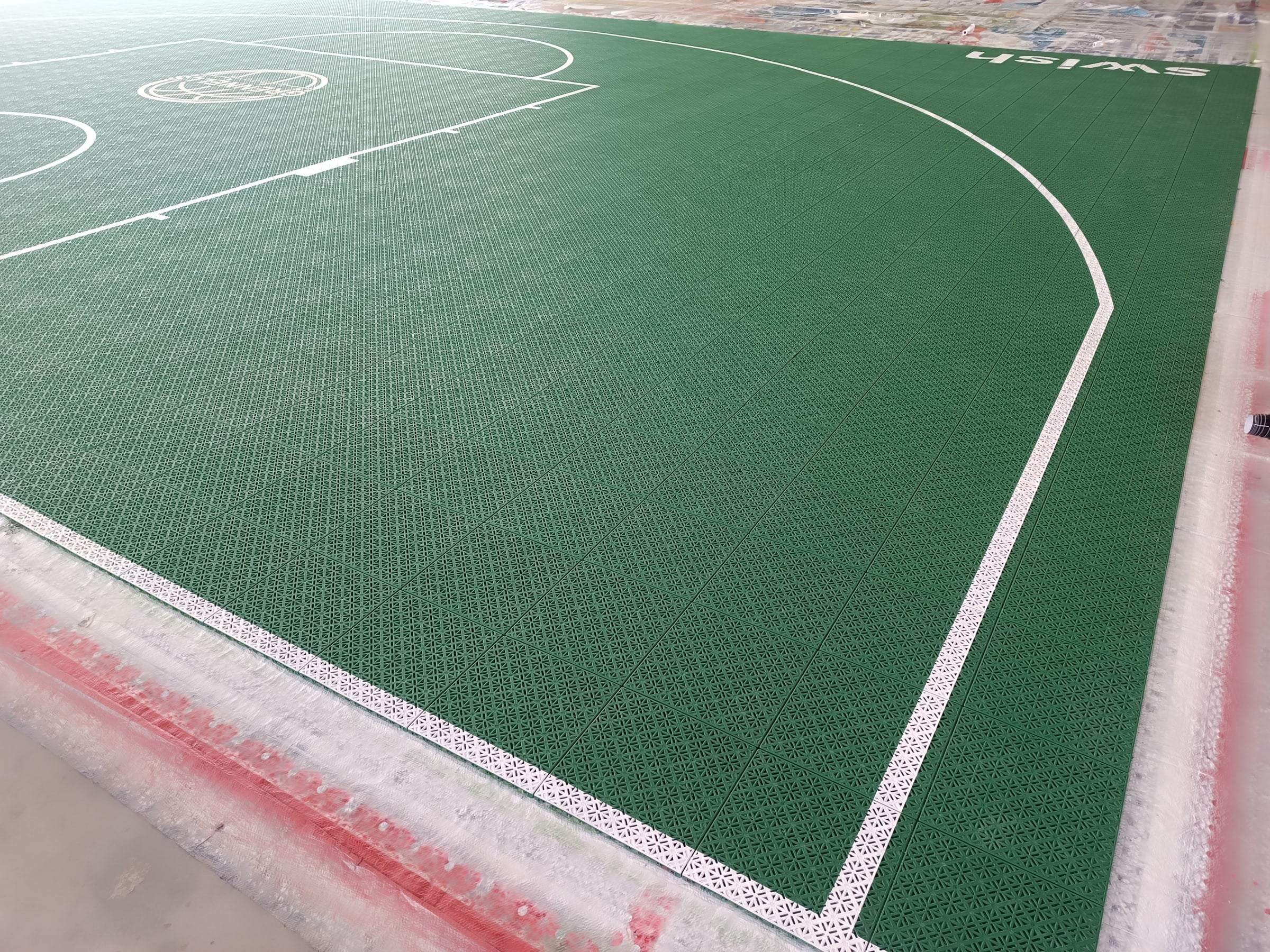 green Grennells Ashford one-hoop Elastic tile backyard basketball court in Ireland, project photo 8