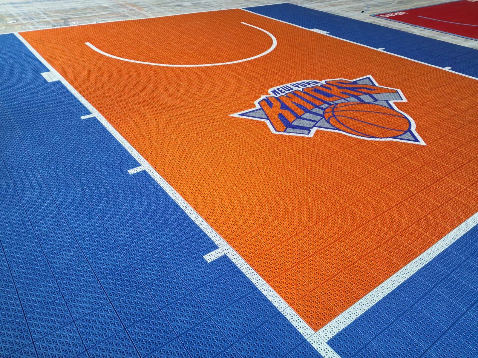 Knicks center artwork, white hash marks, and orange key on Elite tiles, project photo 2