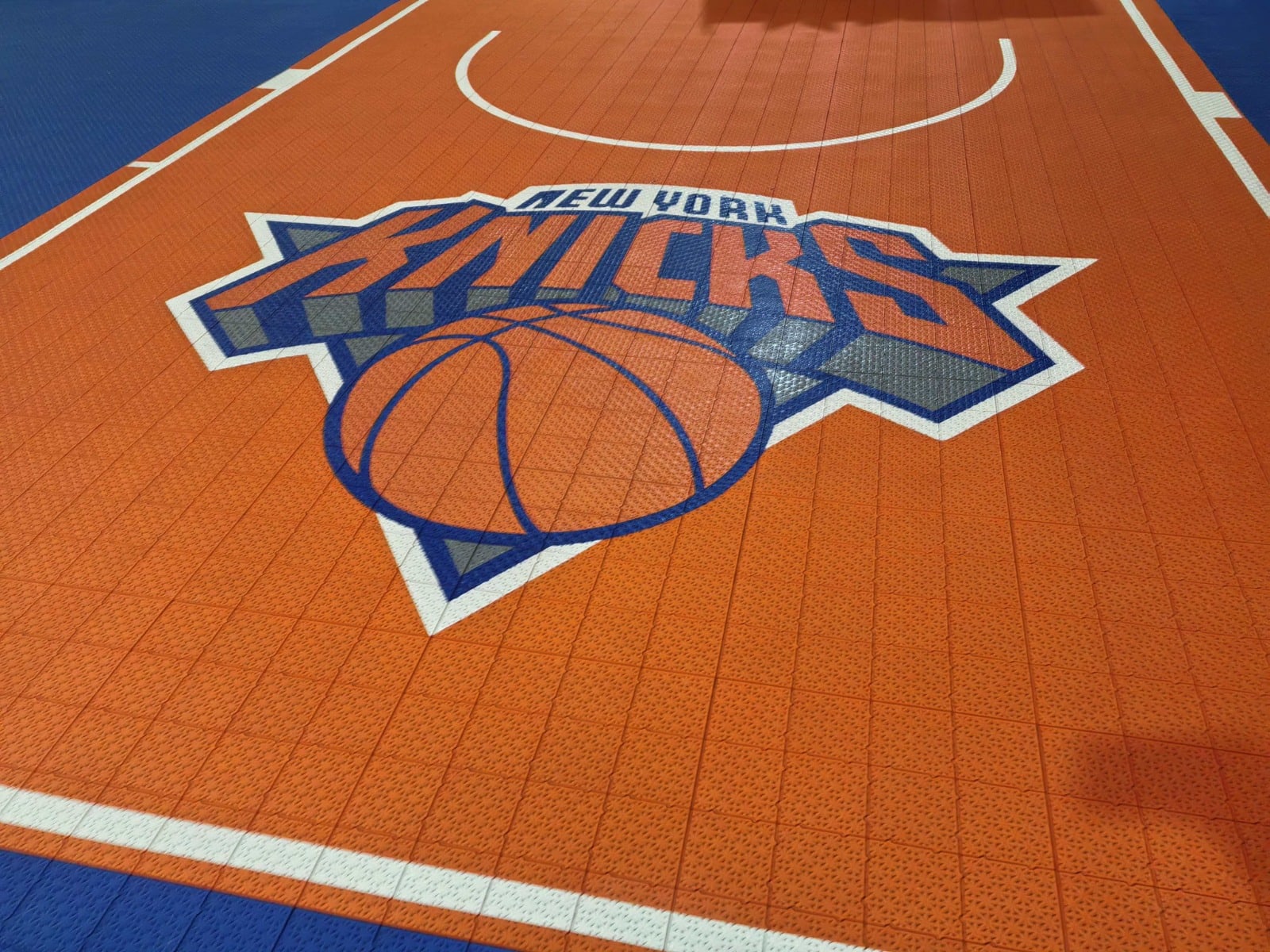 Knicks artwork and white basketball markings on the orange key, project photo 2