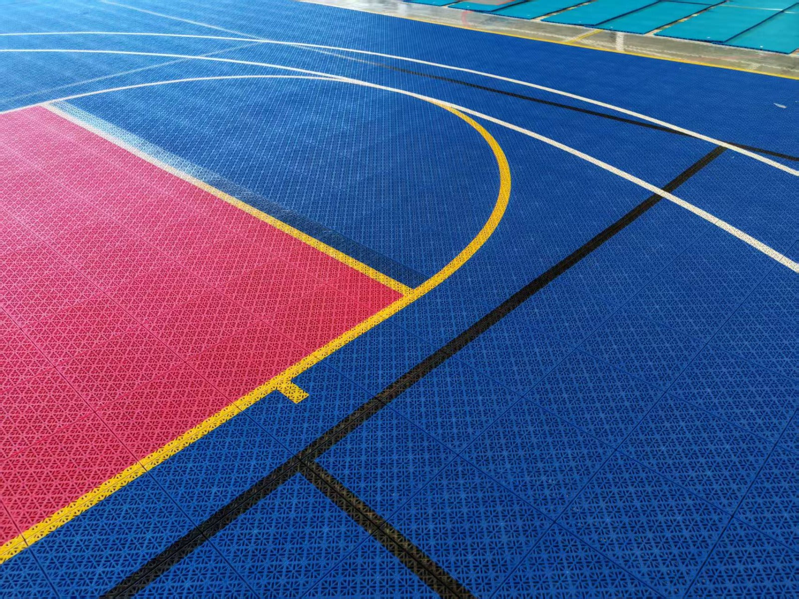 Integrated basketball and pickleball lines on the Missouri Elastic tile court, project photo 4